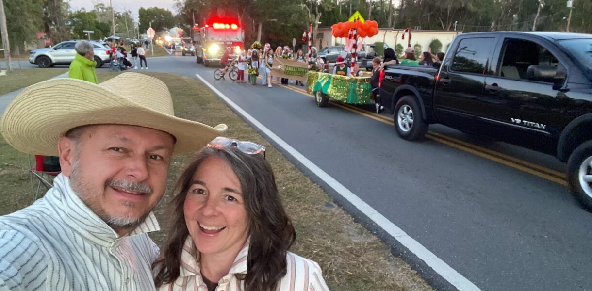 Daybook Cottage Owners John and Kristy Enjoying the Christmas Parade
